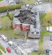  ?? JAY CALLAGHAN PHOTO ?? An outpouring of community compassion and generosity is helping 30 residents of a Main Street Bobcaygeon apartment building following a May 2 fire.