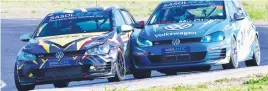  ??  ?? DICE. George Smalberger (Shield Golf GTI) and Keagan Masters (VW Motorsport Golf GTI) fight fot the lead in Saturday’s opening GTC2 race.