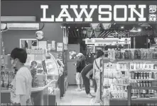  ?? FAN JIANLEI / FOR CHINA DAILY ?? A view of a Lawson convenienc­e store at a subway station in Shanghai in August 2022.