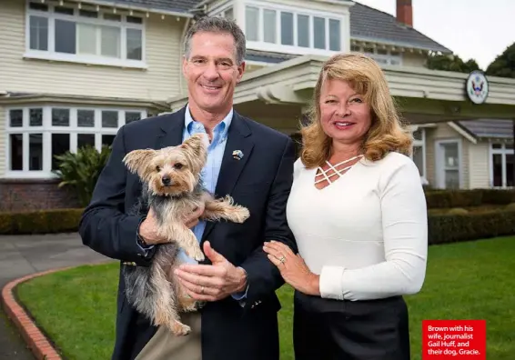  ??  ?? Brown with his wife, journalist Gail Huff, and their dog, Gracie.