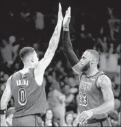  ?? Luis Sinco Los Angeles Times ?? KYLE KUZMA and LeBron James, who scored 44 points, celebrate a basket in the first half.