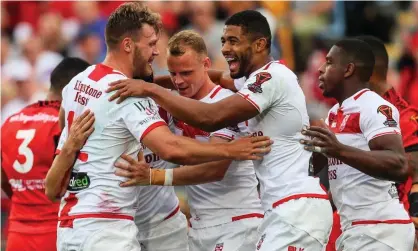  ?? Photograph: NRL Imagery/PA ?? England celebrate after a try in the semi-final against Tonga, but coach Wayne Bennett has played down their final hopes.