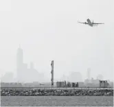  ?? TREVOR COLLENS, AFP/ GETTY IMAGES ?? The New York City Human Rights Commission alleges religious discrimina­tion against Muslims by Pax Assist, a contractor that works at JFK Airport.