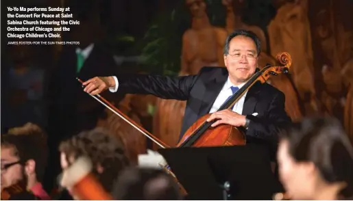  ?? JAMES FOSTER/ FOR THE SUN- TIMES PHOTOS ?? Yo- Yo Ma performs Sunday at the Concert For Peace at Saint Sabina Church featuring the Civic Orchestra of Chicago and the Chicago Children’s Choir.