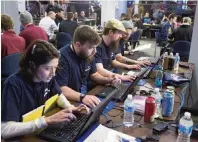  ??  ?? Colleges, government agencies and businesses sponsor the annual National Collegiate Cyber Defense Competitio­n to nurture the talent pipeline. The scenarios tackled by the students have included health insurance hacks. MID-ATLANTIC COLLEGIATE CYBER...