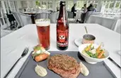  ?? PICTURE: ADRIAN DE KOCK ?? PERFECT PAIRINGS: Craft beers and steak are the stars of the show at the Planet restaurant.