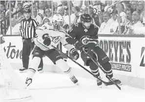  ?? TERRENCE LEE/USA TODAY SPORTS ?? The Predators and defenseman Mattias Ekholm, left, will battle the Jets and left wing Kyle Connor, right, Thursday to advance to the Western Conference finals.