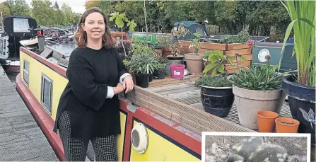  ?? PHOTO: TIM COGHLAN ?? Kitty Stogdon beside her narrowboat in Braunston Marina. The large plant box to her left was where the mallard hen decided to nest.