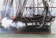  ?? Michael Dwyer / Associated Press ?? “Old Ironsides” fires its cannons in Boston to mark 242 years since the Declaratio­n of Independen­ce.