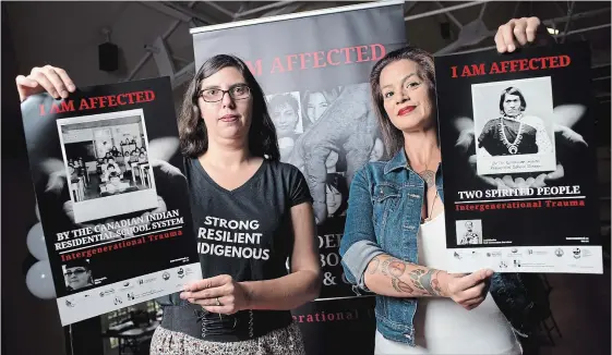  ?? PETER LEE WATERLOO REGION RECORD ?? Luane Roberts, left, and Hollee George hold posters for the “I Am Affected” poster campaign, designed to spark discussion about the residentia­l school system and its lingering effects.