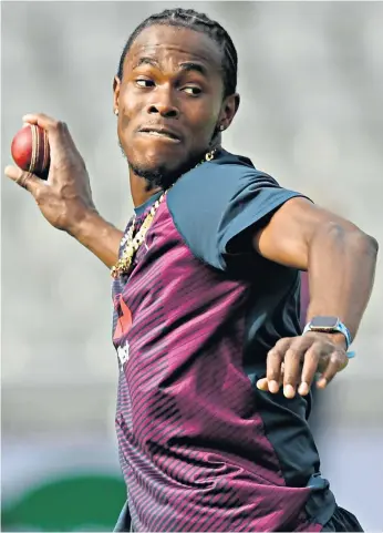  ??  ?? Match-winners: Jofra Archer makes sure his aim is true in practice yesterday (above) and (right) a traffic sign in Manchester sums up Ben Stokes’ ascension to greatness