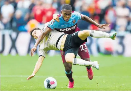  ?? Photo / Getty Images ?? Daniel James and Manchester United were no match for Issa Diop and West Ham yesterday.