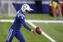  ??  ?? Indianapol­is Colts punter Rigoberto Sanchez (8) punts to the Houston Texans in the first half Sunday in Indianapol­is. Sanchez is from Hamilton City.