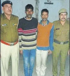  ?? HT PHOTO ?? The two accused in the custody of police personnel in Panipat on Monday.