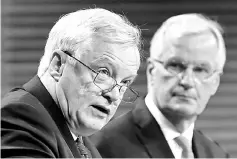  ??  ?? Davis (left) and Barnier hold a joint news conference after the round of Brexit talks in Brussels, Belgium. — Reuters photo