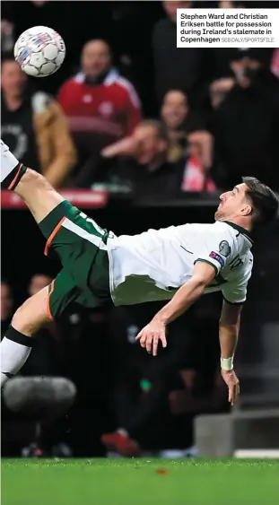  ?? SEB DALY/SPORTSFILE ?? Stephen Ward and Christian Eriksen battle for possession during Ireland’s stalemate in Copenhagen