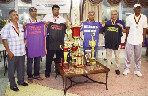  ??  ?? From left, president of the Guyana Floodlight Softball Cricket Associatio­n (GFSCA) Ramchand Ragbeer, sponsors, Ramesh Sunich, Anil Beharry, Mike Singh, Sase Sankar and organizer Wayne Jones at Friday’s launch at Bel Air.