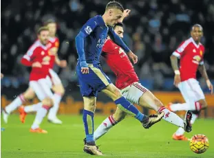  ?? Picture: GETTY IMAGES ?? SENSATIONA­L: Jamie Vardy of Leicester City scores his 11th goal of the Premier League season against Manchester United at King Power Stadium, Leicester, yesterday