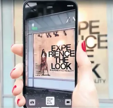  ?? Pictures: YouTube ?? Store mannequins appear to come to life and model clothes when viewed on the phone screens of shoppers, who can click to buy the garments.