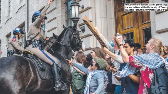  ?? ?? Police confront demonstrat­ors protesting the war in Gaza at the University of Texas in Austin. Picture: Getty Images via AFP