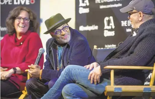  ?? Photograph­s by Ana Venegas For The Times ?? SPIKE LEE, center, and Barry Alexander Brown dig into “BlacKkKlan­sman” with The Times’ Mary McNamara.