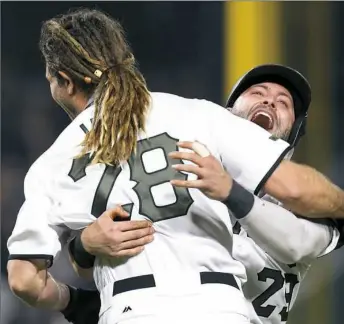  ?? Justin K. Aller/Getty Images ?? Francisco Cervelli, rear, celebrates with John Jaso after Jaso drove in the winning run in the 10th inning Saturday night at PNC Park. Jaso earlier knocked in the tying run in the ninth.