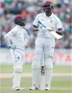  ?? — Reuters ?? West Indies’ Jermaine Blackwood (left) and Jason Holder share a joke.