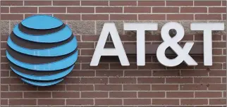  ?? DAVID ZALUBOWSKI — THE ASSOCIATED PRESS ?? AT&T Inc. said Friday that a widespread outage that took hours to resolve Thursday was caused by “an incorrect process” while expanding the wireless network.