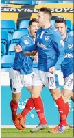  ??  ?? ALL SMILES: Portsmouth cheer McNulty’s goal