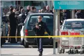  ?? PICTURE: EPA/AFRICAN NEWS AGENCY (ANA) ?? Police in the parking lot of a supermarke­t in Trebes, southern France, where a gunman was holding hostages yesterday. He had entered the shop screaming: ‘Allahu akbar, (God is greatest). I’ll kill you all.’