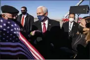  ?? MICHAEL CONROY — THE ASSOCIATED PRESS ?? Former Vice President Mike Pence greets supporters after arriving back in his hometown of Columbus, Ind., in January.