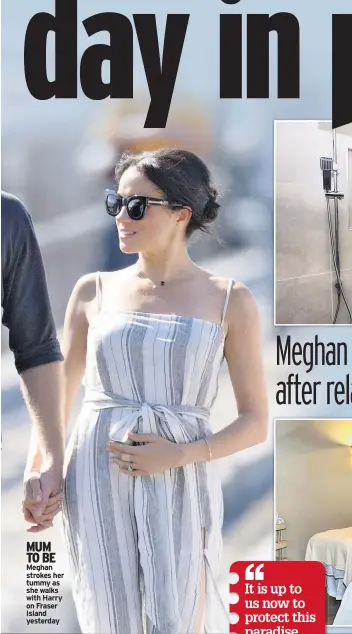  ??  ?? MUM TO BE Meghan strokes her tummy as she walks with Harry on Fraser Island yesterday