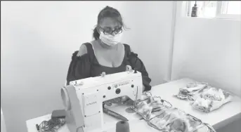  ??  ?? Face masks being produced by the Guyana Foundation (Guyana Foundation photo)