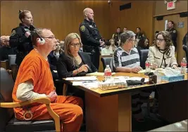  ?? ED WHITE — THE ASSOCIATED PRESS ?? From left, James Crumbley, defense lawyer Mariell Lehman, Jennifer Crumbley, and defense lawyer Shannon Smith await sentencing in Oakland County, Mich., court on Tuesday. The Crumbleys were convicted of involuntar­y manslaught­er for a school shooting committed by their son in 2021.