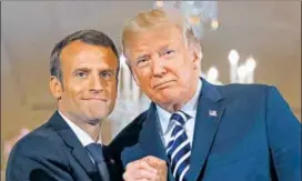  ?? AP ?? Friends no more? Emmanuel Macron and Donald Trump in happier times.