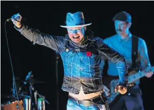  ??  ?? Gord Downie, shown on stage Friday in Toronto, has performed two concerts featuring music from his latest solo effort, Secret Path, which tells the story of 12-yearold Chanie Wenjack, who died in 1966 after running away from a residentia­l school in...