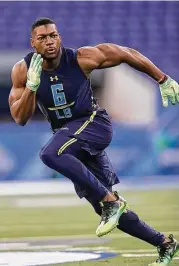  ?? David J. Phillip / Associated Press ?? UH linebacker Tyus Bowser ran the 40-yard dash in 4.65 seconds at the NFL scouting combine.
