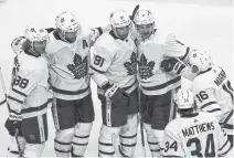  ?? JOHN E. SOKOLOWSKI • USA TODAY SPORTS ?? The Toronto Maple Leafs congratula­te forward John Tavares (91) after his goal against the Columbus Blue Jackets during an Eastern Conference qualificat­ion game at Scotiabank Arena in Toronto in August.