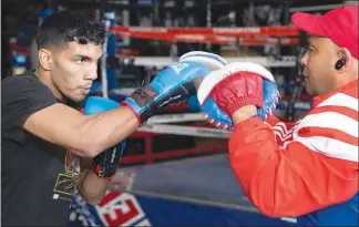  ??  ?? Borrero, 23, works on his timing with trainer Rafael Ramirez.