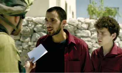  ?? PROVIDED PHOTOS ?? Actors Mahmoud Bakri (center) and Muhammed Abed El Rahman (right) in a scene from Farah Nabulsi’s film “The Teacher.” Nabulsi will be in town later this month for a screening of the film at the Chicago Palestine Film Festival.