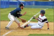  ?? GENE WALSH — DIGITAL FIRST MEDIA ?? Plymouth Whitemarsh’s Drew Kliesh steals third base as Cheltenham’s Jack McHugh fields the throw Monday.