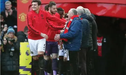  ??  ?? Eleven ‘guests of honour’ replaced the child mascots at Sunday’s game. Photograph: Martin Rickett/PA