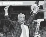  ?? DAVID J. PHILLIP / AP ?? North Carolina head basketball coach Roy Williams cuts down the net after the Tar Heels’ victory over Gonzaga in the championsh­ip game of the NCAA Tournament on April 3 in Glendale, Ariz. Last month, the NCAA announced it would not penalize North...