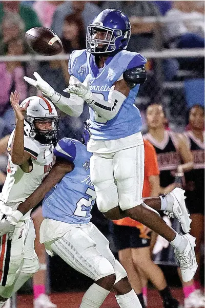  ?? ?? Hooks’ Emmanuel Baird intercepts a pass against Dekalb on Friday, Oct. 27, 2023, in Hooks, Texas. (Photo by JD for the Texarkana Gazette)