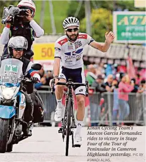  ??  ?? Kinan Cycling Team’s Marcos Garcia Fernandez rides to victory in Stage Four of the Tour of Peninsular in Cameron Highlands yesterday.