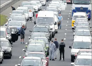  ??  ?? Frustrated drivers endured a four-hour standstill after a shocking smash on the M62