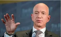  ?? AP ?? Amazon CEO Jeff Bezos says he has received a written threat to publish intimate photograph­s of him if he does not end an investigat­ion into the National Enquirer and its publisher.