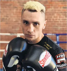  ?? PHOTO: GREGOR RICHARDSON ?? Put ‘em up . . . Dunedin boxer Chase Haley prepares for his bout against Andrei Mikhailovi­ch at New Zealand Fight and Fitness earlier this week.