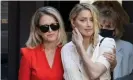  ??  ?? Amber Heard arrives at court with her lawyer, Jennifer Robinson. Photograph: Peter Macdiarmid/LNP