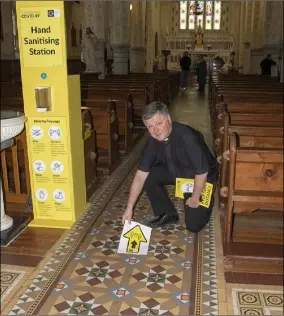  ??  ?? Fr John Carroll making preparatio­ns for re-opening at Barntown Church.
